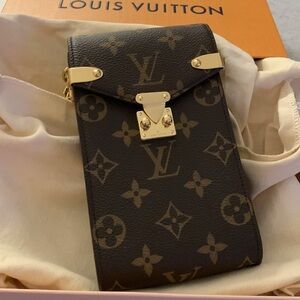 Rare Louis Vuitton monogram authentic new collection small purse w/golden chain.